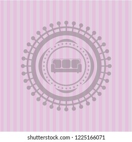 couch icon inside retro pink emblem