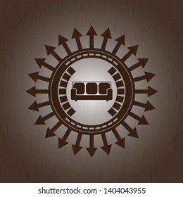 couch icon inside retro wooden emblem