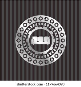 couch icon inside silver badge