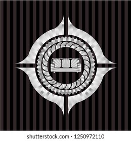 couch icon inside silver badge or emblem