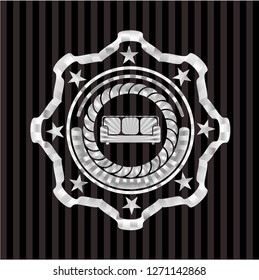 couch icon inside silver emblem or badge