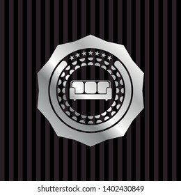 couch icon inside silver shiny badge