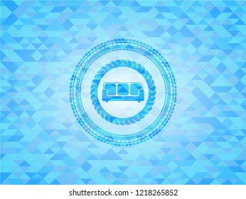 couch icon inside sky blue emblem. Mosaic background