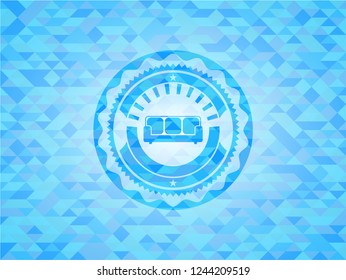 couch icon inside sky blue emblem. Mosaic background