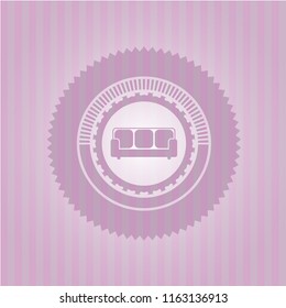 couch icon inside vintage pink emblem