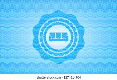 couch icon inside water concept style badge.
