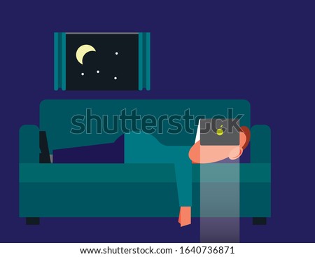 Couch potato man lying on sofa binge watching television show on streaming service late at night