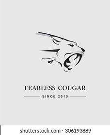 Cougar Head. Cougar Head combine with text. Cougar. Fearless Cougar. label. Cougar Mascot Head Vector Graphic.  Roaring Predator. tiger head, roaring fang face