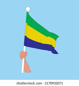 country flag, hand drawing holding gabon flag tightly