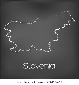 A Country Shape isolated on chalk board with the name and shape of Slovenia