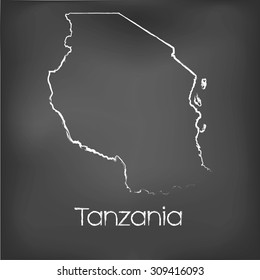 A Country Shape isolated on chalk board with the name and shape of Tanzania