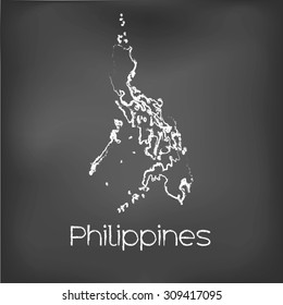 A Country Shape isolated on chalk board with the name and shape of Philippines