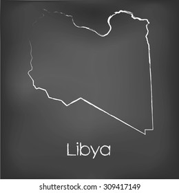 A Country Shape isolated on chalk board with the name and shape of Libya
