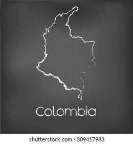 A Country Shape isolated on chalk board with the name and shape of Colombia