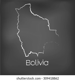 A Country Shape isolated on chalk board with the name and shape of Bolivia