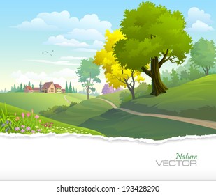 Country side view of a town with green trees, fresh grass and blue sky