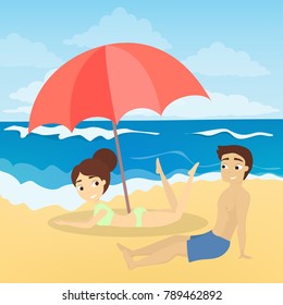 Couple at the beach sunbathing on the sand.