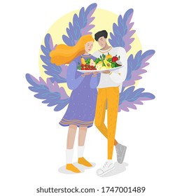 Couple with big plate of healthy organics foods - vegetables and fruits. Concept of same nutrition in the family. For vegan and vegetarian healthcare promo, healthy lifestyle