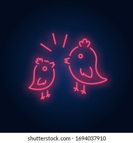 Couple of birds neon sign. Two pink birds with yellow crest twittering to each other on brick wall background. Vector illustration in neon style for topics like love, spring, nature