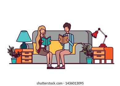 couple with book in hands in living room