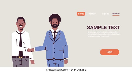 couple businessmen handshaking business partners hand shake during meeting agreement partnership concept african american male colleagues standing together portrait horizontal copy space