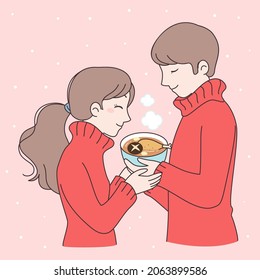 A couple carries a bowl of chicken soup together.