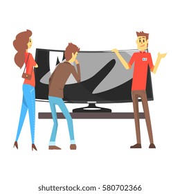 Couple Choosing Wide TV With Shop Assistant Help, Department Store Shopping For Domestic Equipment And Electronic Objects For Home