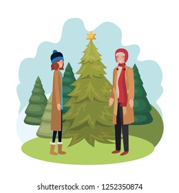 couple with christmas tree in landscape