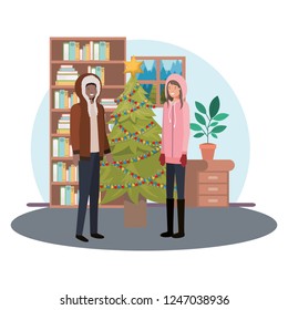 couple with christmas tree in livingroom