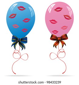 couple of colorful balloons with prints of women's lips