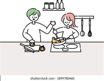 A couple cooking in the kitchen