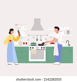 The couple is cooking in the kitchen. Apron for cooking. Cozy kitchen with appliances and utensils.