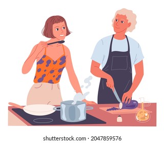Couple cooking together. Woman cooks on the stove, man chops vegetables
