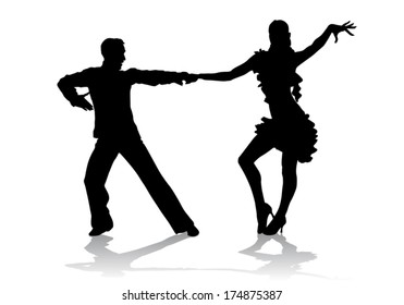 A couple in costumes dancing Latin dances