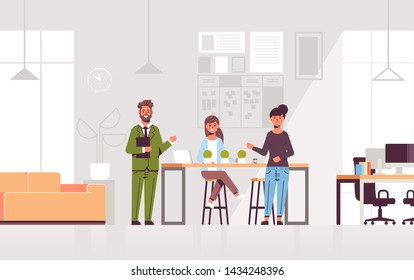 couple coworkers pointing at new female employee introducing hired worker to the team concept modern co-working center office interior flat full length horizontal