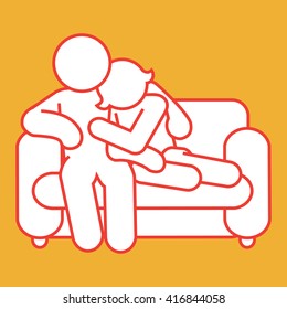 Couple Cuddling On The Sofa/couch