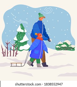 Couple dad and son walking in winter in cool weather. Happy family resting in warm clothes outdoors in cold winter. Father makes a snowball and child is going to sled. Winter outdoor activities