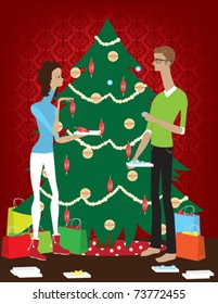 A couple decorating their Christmas tree.