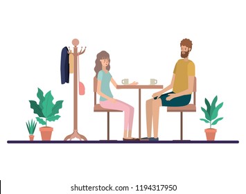 couple drinking coffee in the living room