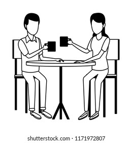 Couple drinking coffee on table in black and white
