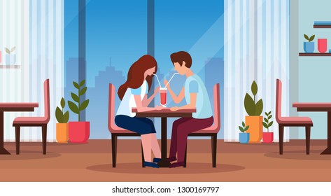 couple drinking coffee through straw together happy valentines day concept man woman in love romantic dating modern restaurant interior horizontal full length flat