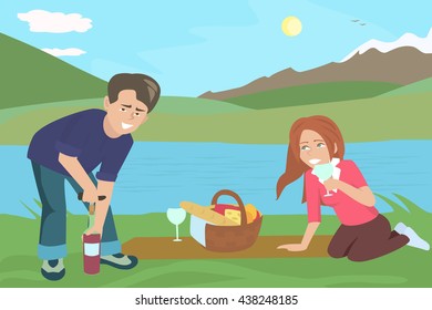 couple drinking wine at picnic