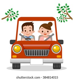 Couple driving in car