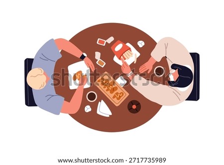 Couple eating, sitting at dining table with fast junk food, overhead top down view. People having meal, French fries, chicken wings, from above. Flat vector illustration isolated on white background