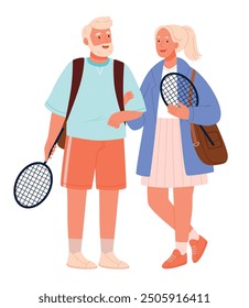 A couple of elderly people are playing tennis.Outdoor activity for retired people, healthy lifestyle.