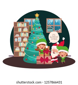 couple of elves and santa claus with christmas tree