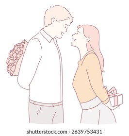 A couple enjoying a romantic moment surrounded by flowers and a thoughtful gift. Love is in the air