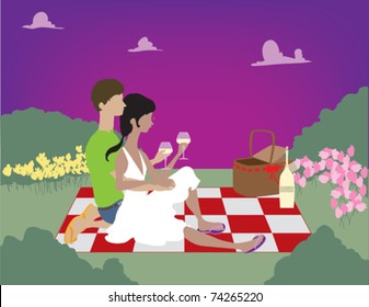 A couple enjoying a romantic night time picnic.