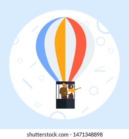 couple flying in basket of hot air balloon african american man using tablet woman pointing hand at something romantic date concept flat