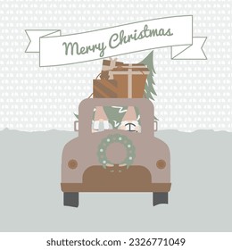 Couple of gnomes in their Christmas van carrying presents and a tree.